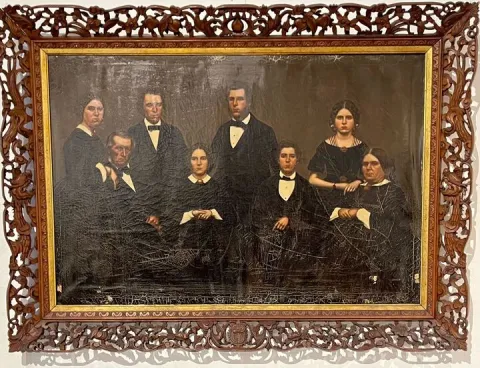 oil painting of a family in formal clothes