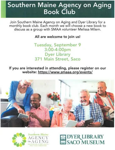 a group of seniors looking at e-readers