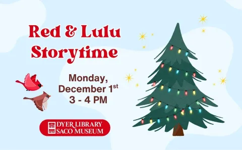 tree with lights and cardinals