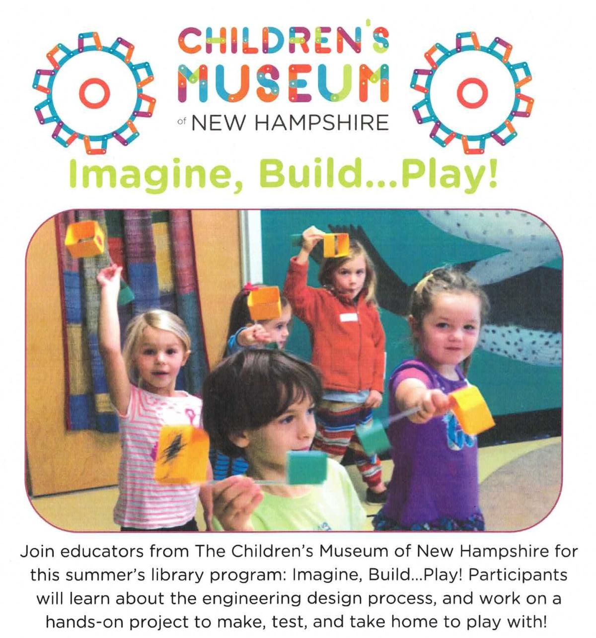 children holding paper projects