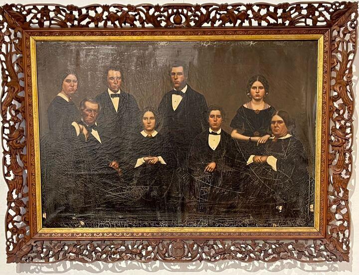 oil painting of a family in formal clothes