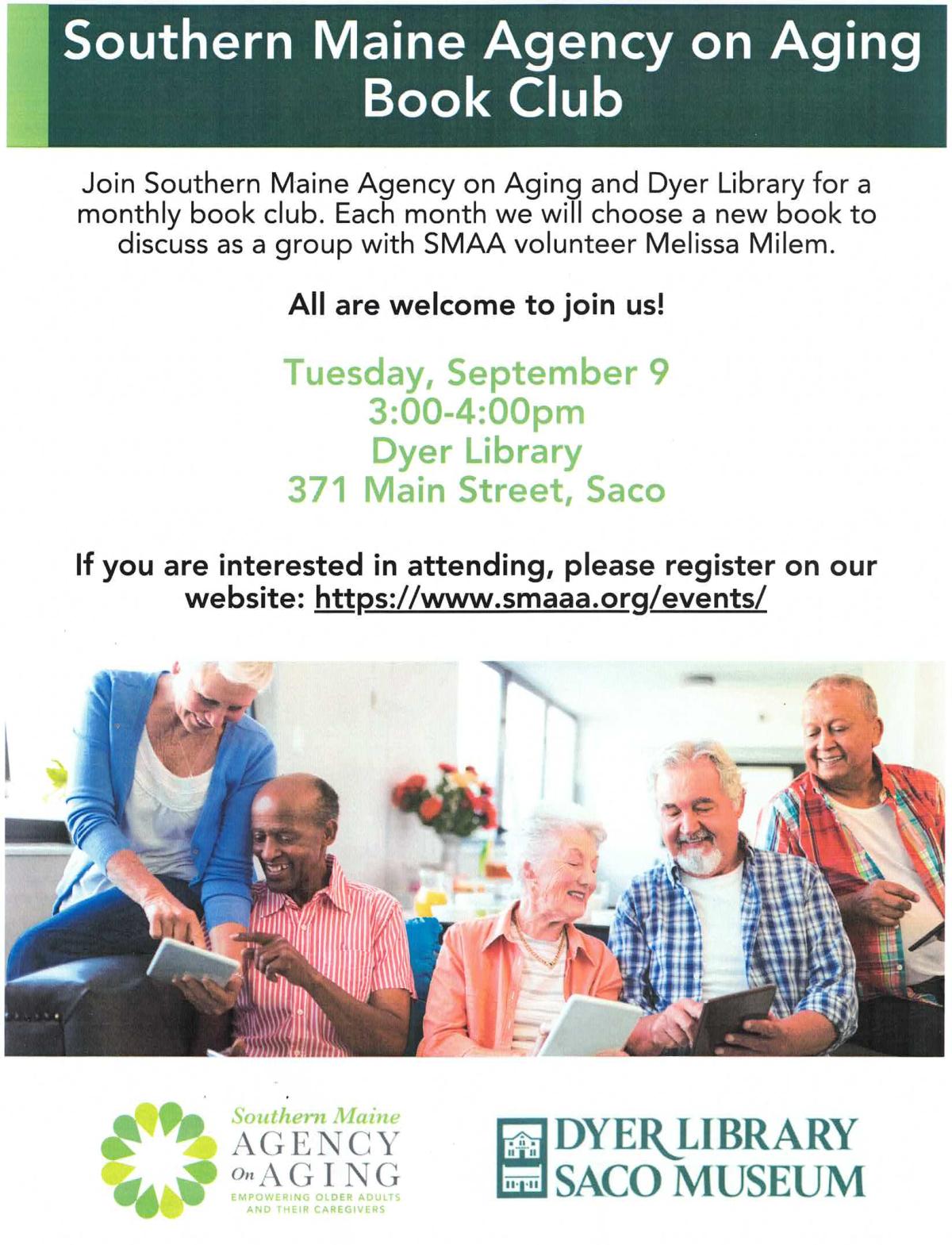 a group of seniors looking at e-readers